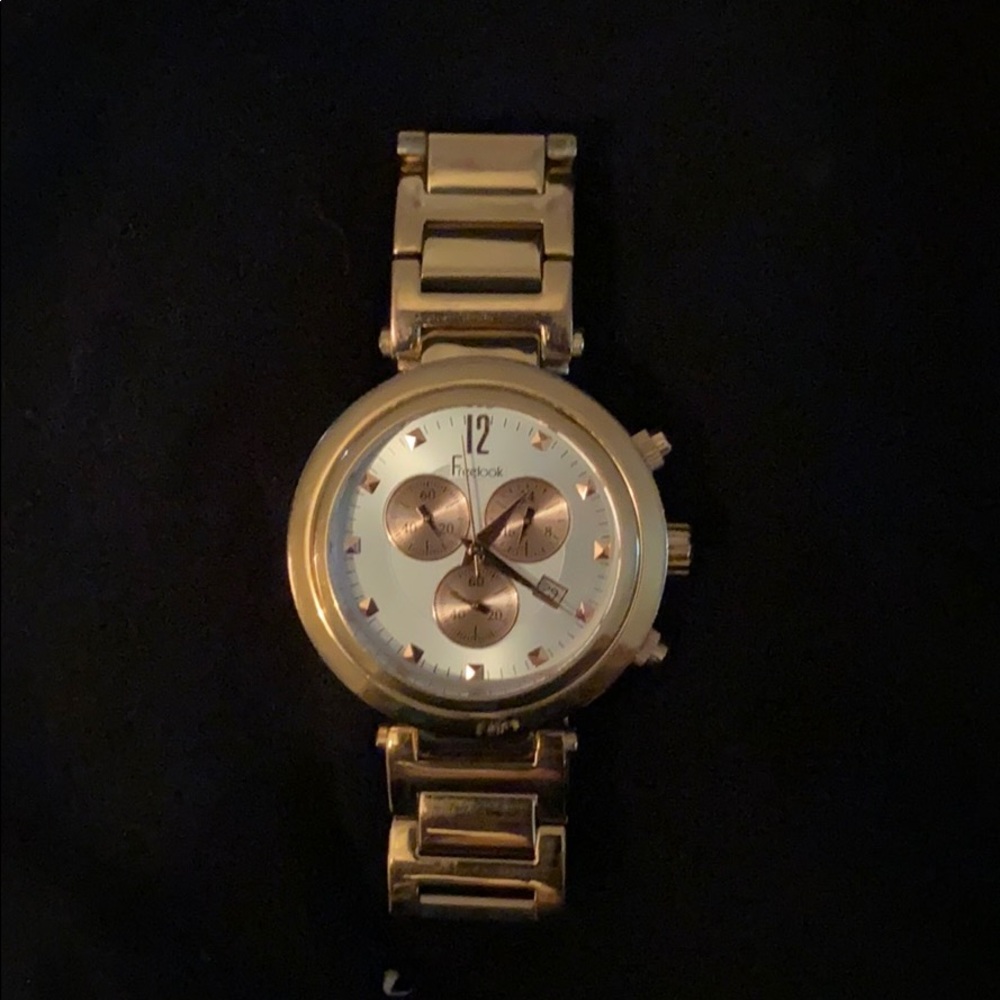 Freelook gold plated watch